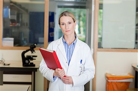scientist looking at camera - Female doctor Stock Photo - Premium Royalty-Free, Code: 614-03648773