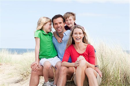 Happy family at the coast Stock Photo - Premium Royalty-Free, Code: 614-03648921