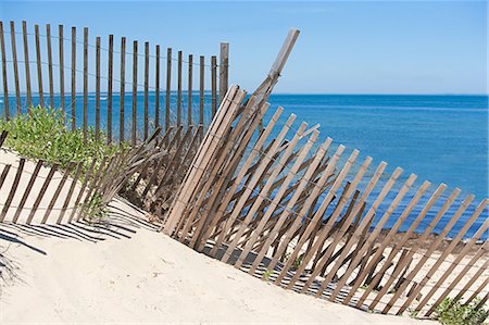 sand hill - Fence on a beach, Montauk, Long Island Foto de stock - Sin royalties Premium, Código: 614-03649012