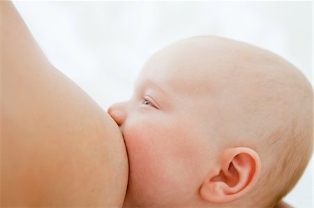 pictures of baby face side profile - Baby breast feeding Stock Photo - Premium Royalty-Free, Code: 614-03684090