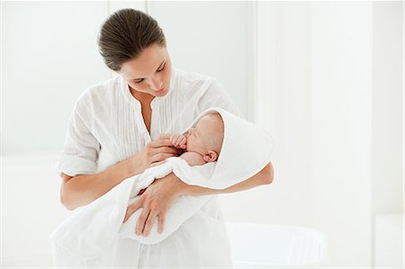 Mother and baby son wrapped in towel Stock Photo - Premium Royalty-Free, Code: 614-03684130