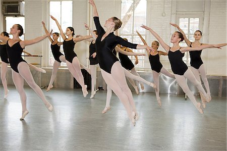 pic of black kids in group - Ballerinas jumping Stock Photo - Premium Royalty-Free, Code: 614-03684410