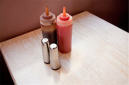 simsearch:614-03684735,k - Condiments on cafe table Stock Photo - Premium Royalty-Free, Code: 614-03684735