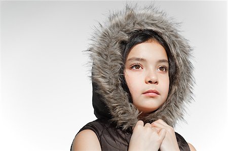Girl wearing fur hood Foto de stock - Sin royalties Premium, Código: 614-03684842