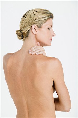 female back shoulder - Nude woman's back Stock Photo - Premium Royalty-Free, Code: 614-03763540