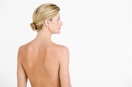 Nude woman's back Stock Photo - Premium Royalty-Free, Code: 614-03763578