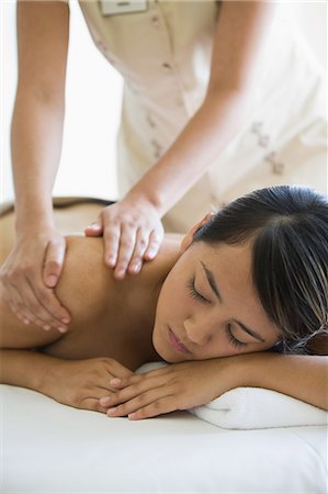 simsearch:614-03020079,k - Young woman having shoulder massage Stock Photo - Premium Royalty-Free, Code: 614-03763909