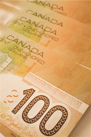 Canadian 100 dollar banknotes Foto de stock - Sin royalties Premium, Código: 614-03763973