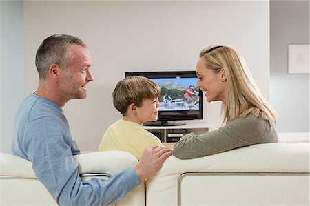 simsearch:614-03784139,k - Family watching television Stock Photo - Premium Royalty-Free, Code: 614-03784136