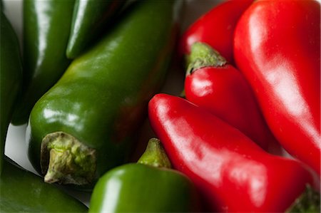 Green and red chilli peppers, full frame Stock Photo - Premium Royalty-Free, Code: 614-03784180