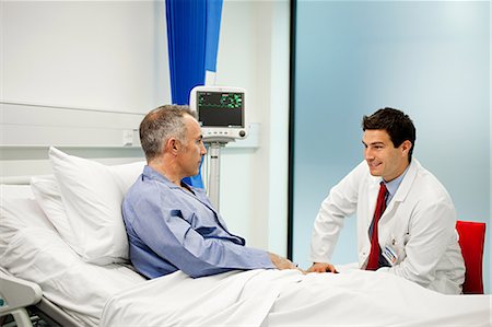 sick men in hospital bed - Male patient with doctor Stock Photo - Premium Royalty-Free, Code: 614-03783658