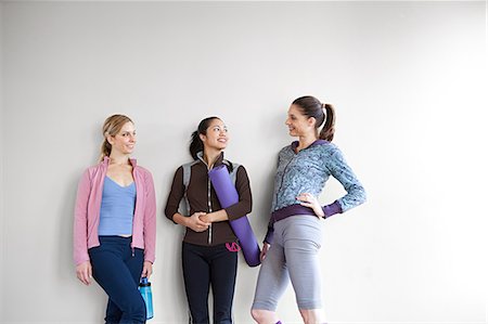 dance studio - Three women in dance studio standing by wall Stock Photo - Premium Royalty-Free, Code: 614-03783835