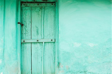 Green wooden door and wall of village house near Mysore, Karnataka Stock Photo - Premium Royalty-Free, Code: 614-03818884