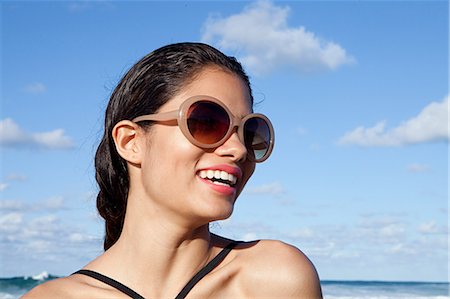 puerto rico beach - Woman on beach wearing sunglasses Stock Photo - Premium Royalty-Free, Code: 614-03903746