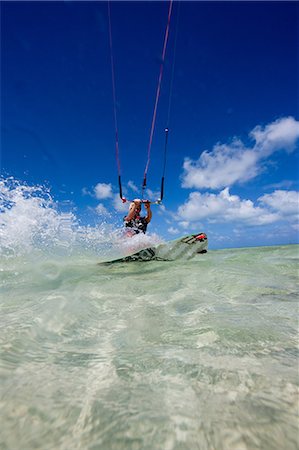 Kiteboarding in shallow water Stock Photo - Premium Royalty-Free, Code: 614-03903827