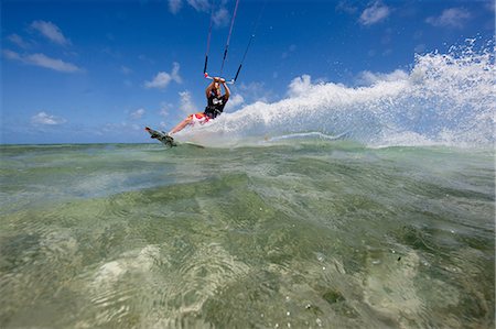 Kiteboarding in shallow water Stock Photo - Premium Royalty-Free, Code: 614-03903829