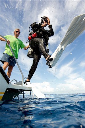 sommozzatore (uomo e donna) - Giant stride entry into water Fotografie stock - Premium Royalty-Free, Codice: 614-03903833