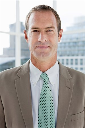 serious african people portrait - Businessman in office, portrait Stock Photo - Premium Royalty-Free, Code: 614-03981628