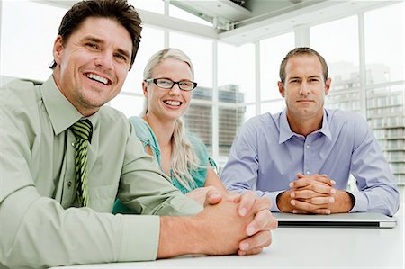 simsearch:614-03981680,k - Three businesspeople meeting in office Stock Photo - Premium Royalty-Free, Code: 614-03981681