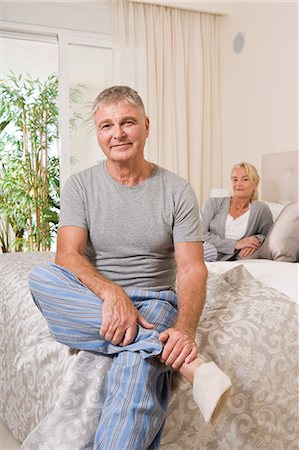 retirement and relaxation at home - Mature couple in bedroom Stock Photo - Premium Royalty-Free, Code: 614-03981894