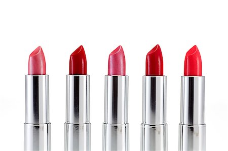 rossetto - Five lipsticks in a row Fotografie stock - Premium Royalty-Free, Codice: 614-03982117