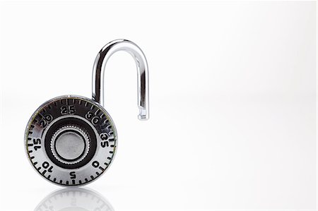 padlock - Open combination lock Stock Photo - Premium Royalty-Free, Code: 614-03982119