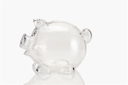 piggy banks losing money - Empty transparent piggy bank Stock Photo - Premium Royalty-Free, Code: 614-03982121