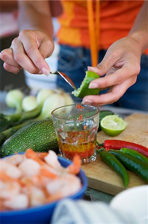 shellfish sweden - A person preparing a marinade in a glass. Stock Photo - Premium Royalty-Free, Code: 6102-03748665