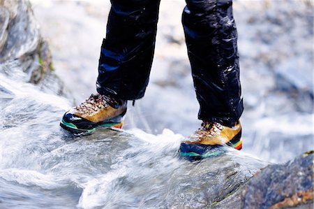 Boots in a stream. Stock Photo - Premium Royalty-Free, Code: 6102-03749017