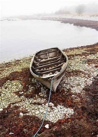 rowboat fog pictures - A rowing boat on a reef. Stock Photo - Premium Royalty-Free, Code: 6102-03749164