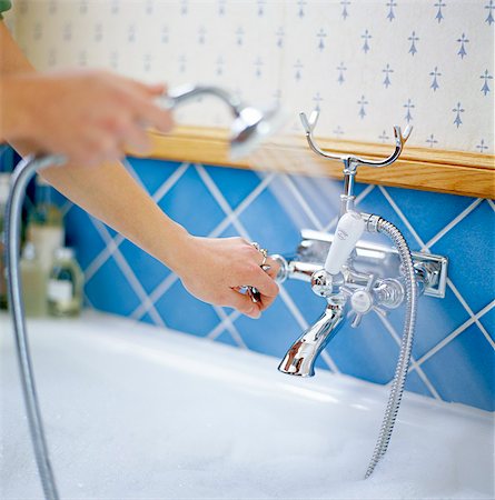 A shower in a bathtub. Stock Photo - Premium Royalty-Free, Code: 6102-03749469