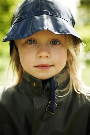 Girl wearing rain clothes. Stock Photo - Premium Royalty-Free, Code: 6102-03749701