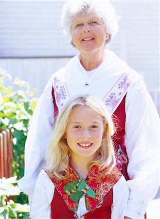 Portrait of a girl and a woman wearing national costumes. Stock Photo - Premium Royalty-Free, Code: 6102-03749804