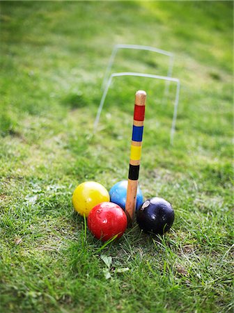 Croquet balls on a lawn. Foto de stock - Sin royalties Premium, Código: 6102-03750115