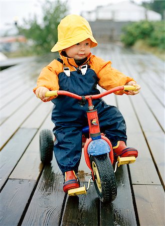 A small girl on a bicycle. Stock Photo - Premium Royalty-Free, Code: 6102-03750254