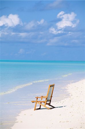 simsearch:6102-08001264,k - A sun chair on a beach, Maldives. Stock Photo - Premium Royalty-Free, Code: 6102-03750471