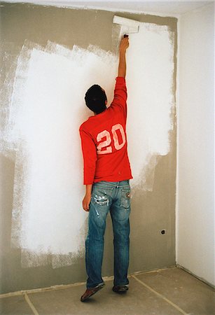 european roller - A man painting a wall. Foto de stock - Sin royalties Premium, Código: 6102-03750425