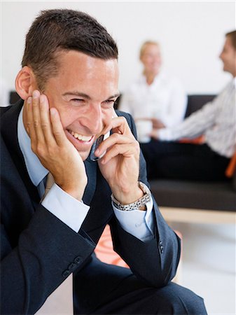 simsearch:6102-03859327,k - A happy businessman talking in a cellphone. Stock Photo - Premium Royalty-Free, Code: 6102-03750634