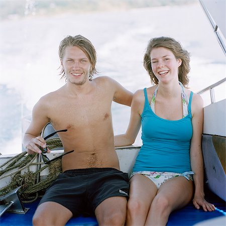 simsearch:6102-03751079,k - Young couple in a motorboat, Thailand. Foto de stock - Royalty Free Premium, Número: 6102-03751079