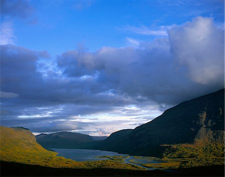 fantastical - Lake surrounded by mountains Stock Photo - Premium Royalty-Free, Code: 6102-03858960