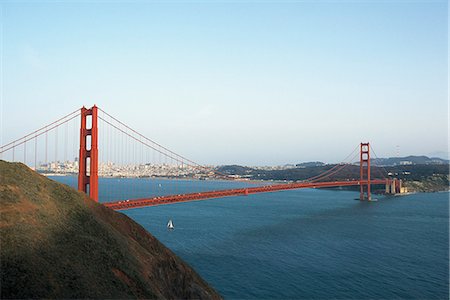 ponte golden gate - View of Golden Gate Bridge against clear sky Foto de stock - Royalty Free Premium, Número: 6102-03858986