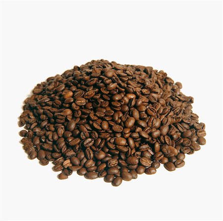 Heap of coffee beans on white background Foto de stock - Sin royalties Premium, Código: 6102-03859337