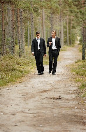 simsearch:6102-03859327,k - Two businessman walking on forest path and talking Stock Photo - Premium Royalty-Free, Code: 6102-03859335