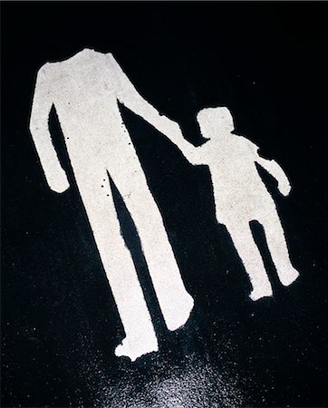 path concept nobody - Sign with figures of father and daughter on road Stock Photo - Premium Royalty-Free, Code: 6102-03859635