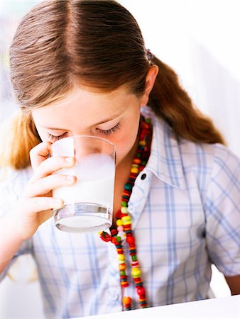 A girl with a glass of milk, Sweden. Stock Photo - Premium Royalty-Free, Code: 6102-03865930