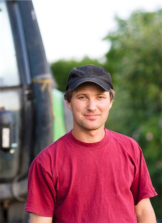 farmer tractor - A farmer and a tractor, Sweden. Stock Photo - Premium Royalty-Free, Code: 6102-03866092