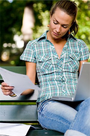 simsearch:6102-03828834,k - Young woman studying in a park, Sweden. Stock Photo - Premium Royalty-Free, Code: 6102-03866391