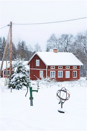 snow covered cottage - A red house in the snow, Sweden. Stock Photo - Premium Royalty-Free, Code: 6102-03866405