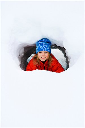 snow cave - A girl playing in the snow, Sweden. Stock Photo - Premium Royalty-Free, Code: 6102-03866412