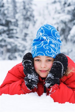 simsearch:6102-03827802,k - A girl playing in the snow, Sweden. Stock Photo - Premium Royalty-Free, Code: 6102-03866425